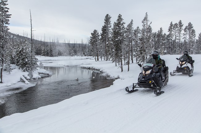 Snowmobilers near Gibbon River