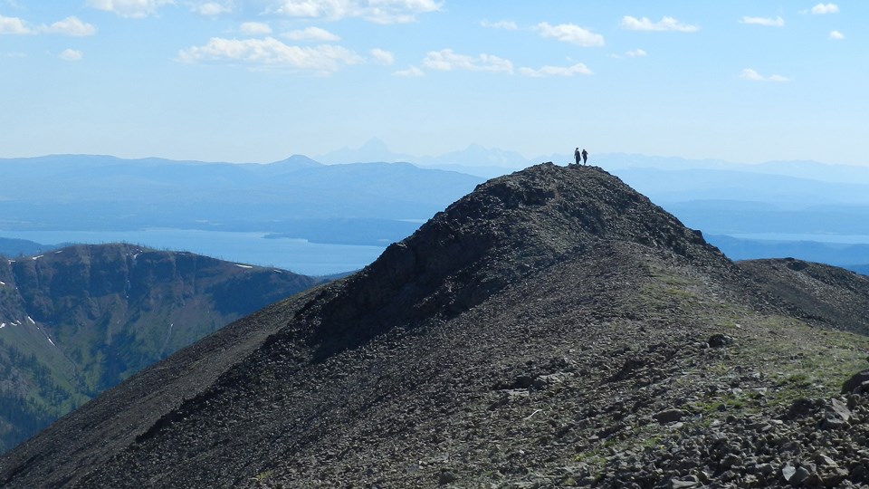 Hikers on the top of Avalanche Peak
