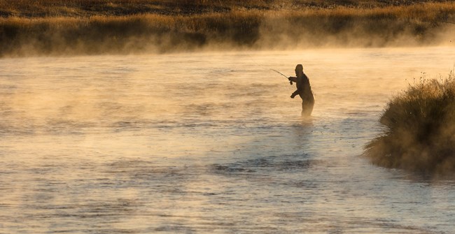 Angler fishing on a lake