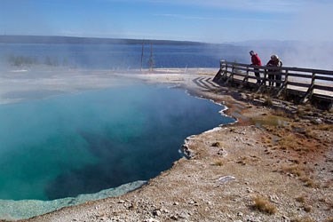 Visitors gaze into the depths of Abyss Pool