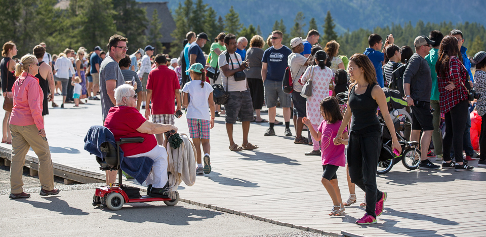 Motorized wheelchair on the boardwalk near Old Faithful Motorized wheelchair on the boardwalk near Old Faithful