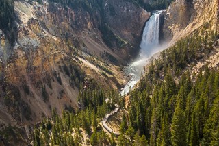 A waterfall in a canyon setting