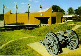 Yorktown Visitor Center with Howitzer in Foreground.