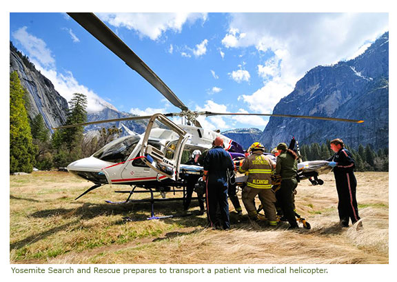 Yosemite Search and Rescue prepares to transport a patient via medical helicopter. Yosemite Search and Rescue prepares to transport a patient via medical helicopter.