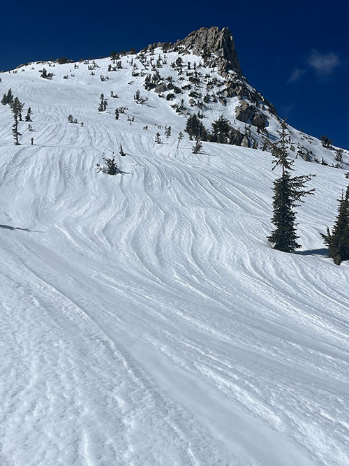 Melt runneled snow on March 9, 2026.