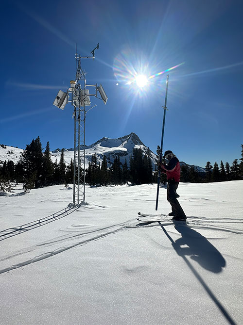 Snow surveying at Vogelsang with 12-foot Mt. Rose sampler, January 28, 2023.