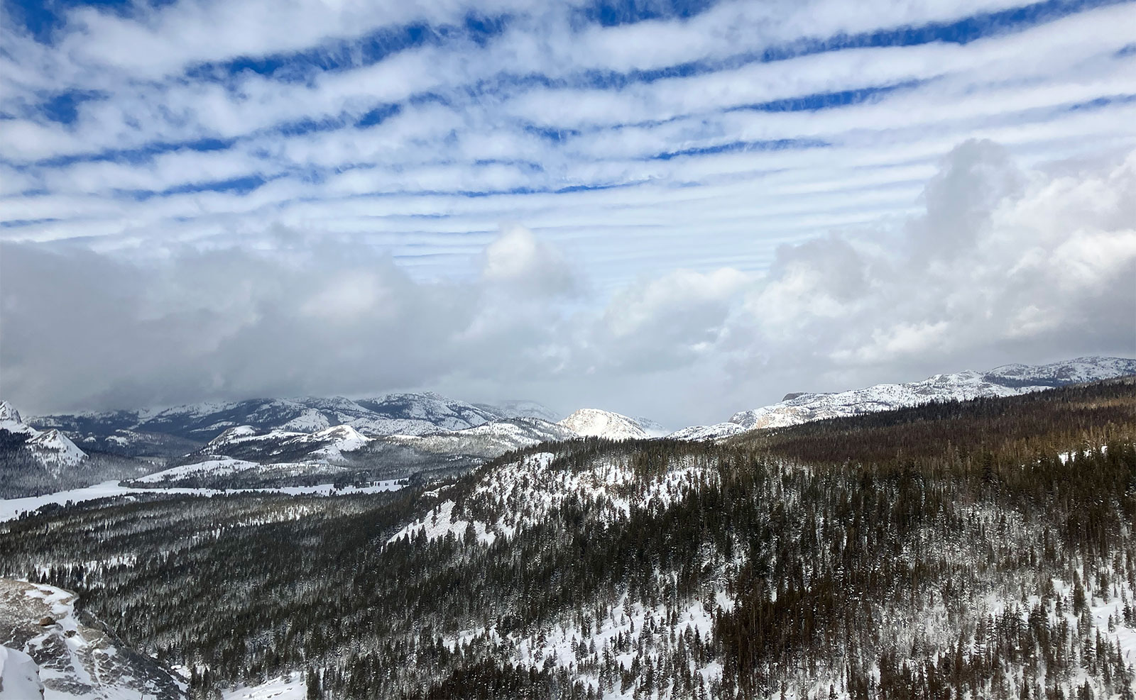 Storm clouds clearing over Tuolumne Meadows on February 7, 2025. Storm clouds clearing over Tuolumne Meadows on February 7, 2025.