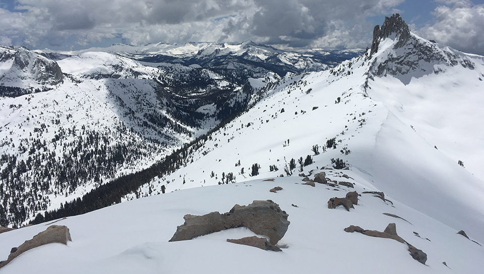 Cockscomb (a mountain near Tuolumne Meadows) rises above the snow on a partly cloudy day on April 21, 2020. Cockscomb (a mountain near Tuolumne Meadows) rises above the snow on a partly cloudy day on April 21, 2020.