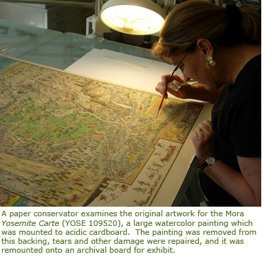 Conservator working on Mora's Yosemite Carte Conservator working on Mora's Yosemite Carte
