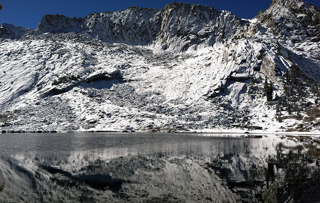 Arete east of Ragged Peak towers over the lower Young Lake Arete east of Ragged Peak towers over the lower Young Lake