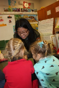 Ranger working with students in a classroom.