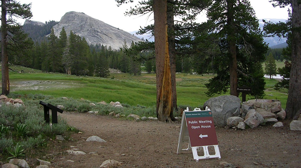 Public open house sign at Parson's Lodge for Tuolumne River Plan with Lembert Dome in background