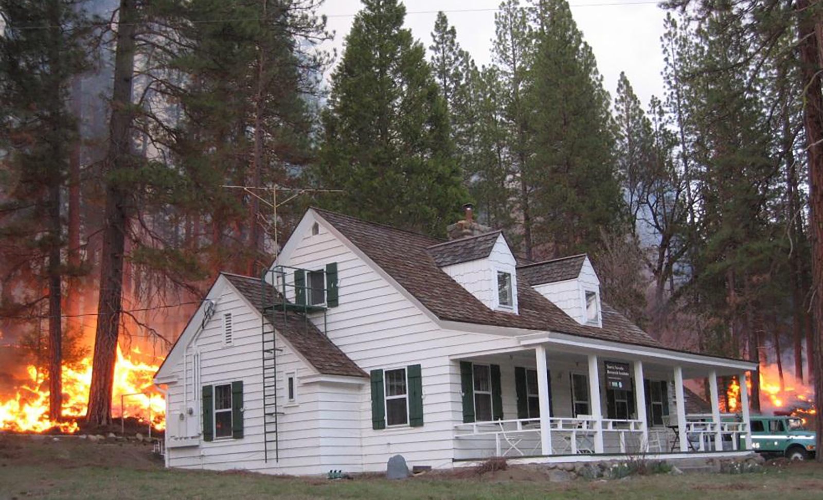 Prescribed fire near a building in Wawona