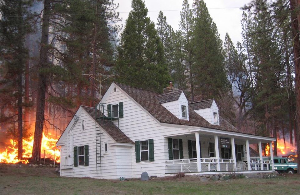 Prescribed fire near a building in Wawona
