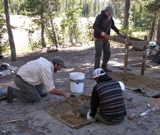 Archeologists doing field survey Archeologists doing field survey