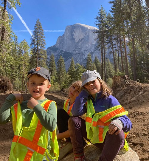 Kids helping to volunteer on a restoration project in Yosemite Valley.