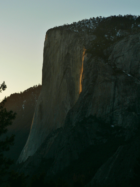 Horsetail Fall glows as the sun sets on a clear evening at the end of February.