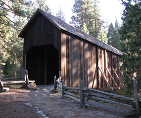 Modern photo of historic bridge with roof