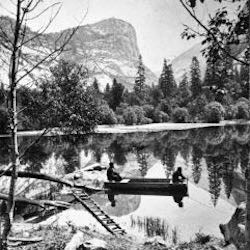 Men in a canoe on a lake