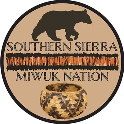 A graphic of a round tan seal with a bear silhouette at the top, the words, "Southern Sierra Miwuk Nation," in the middle, and a woven basket at the bottom.