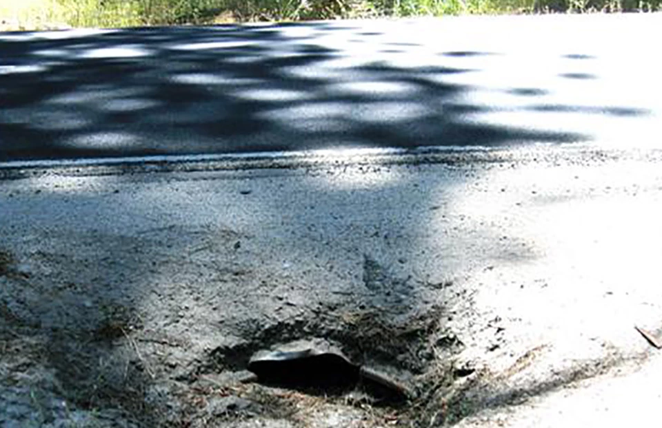 Damaged culvert and Yosemite Valley Loop Road Damaged culvert and Yosemite Valley Loop Road