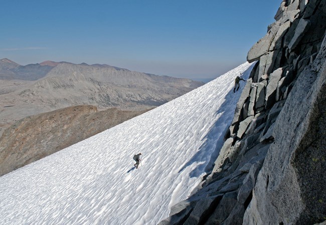 Two hikers on the Lyell Glacier