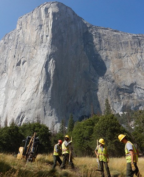 Park staff removes a ditch in El Capitan Meadow.