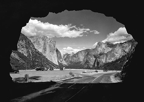 Historic photo of Tunnel View Overlook as seen from inside the tunnel, black and white image.