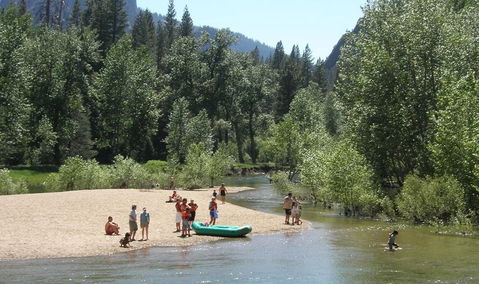 Visitors enjoying the Merced River in July 2008 Visitors enjoying the Merced River in July 2008