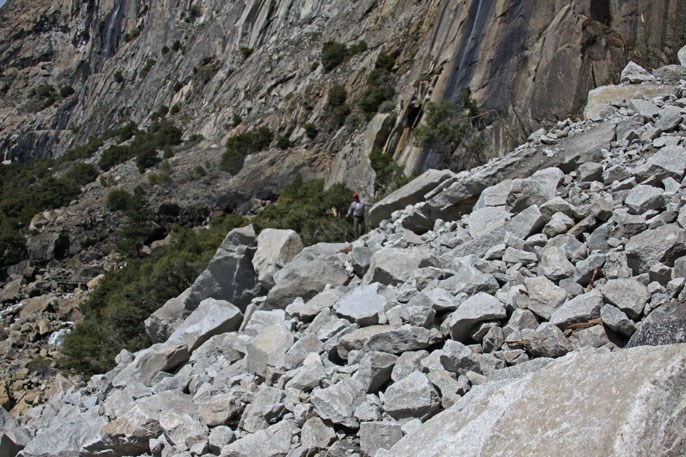 Boulders completely covering covering trail and hillside