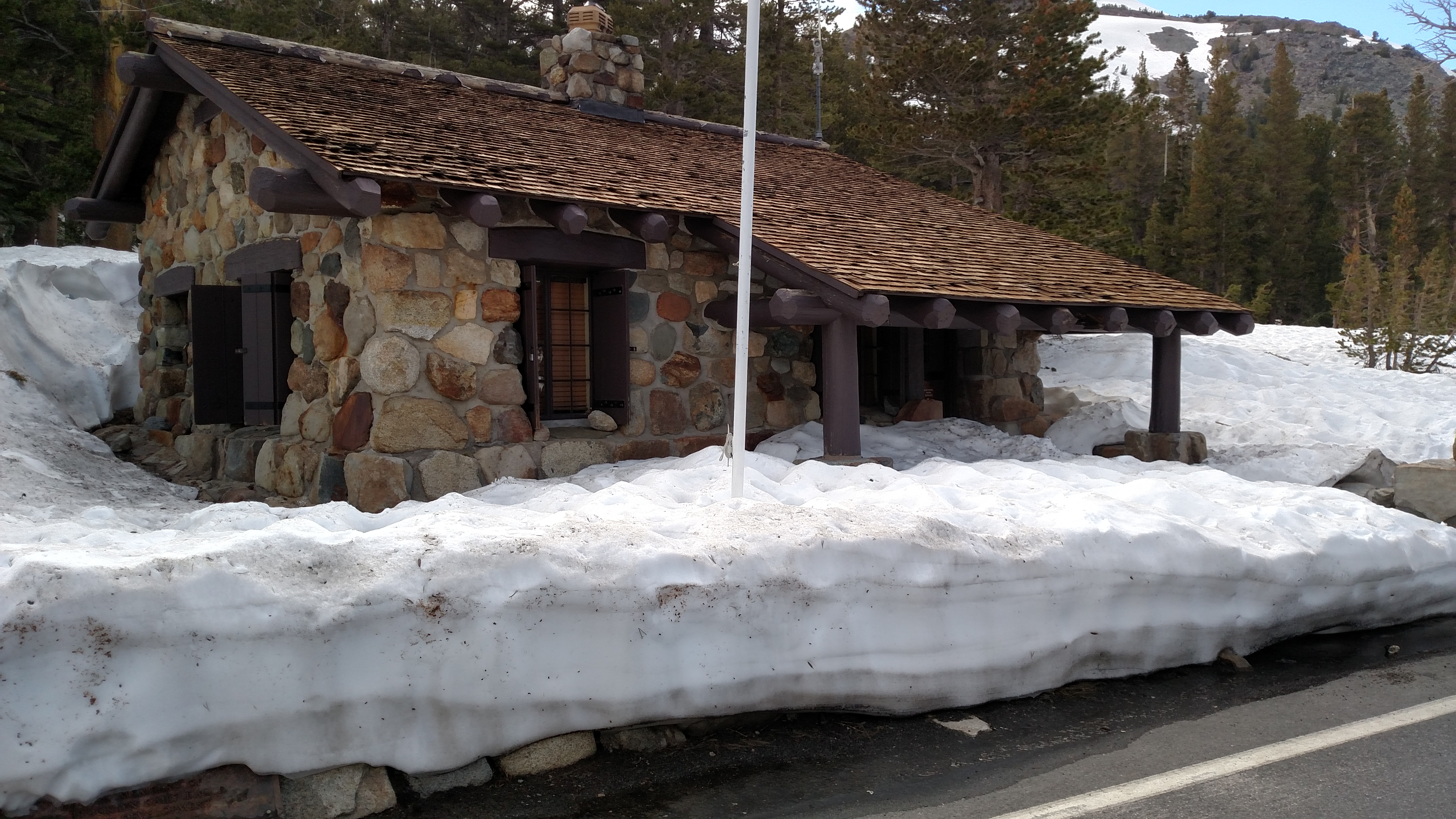 Several feet of snow still surround the entrance station building.