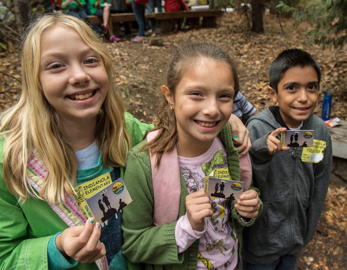 Fourth grade students from Indianola Elementary in Selma, CA proudly display their "Every Kid in a Park" passes. These students, along with approximately 400 other students, received their passes at Yosemite's 125th Anniversary celebration on Oct. 1, 2015