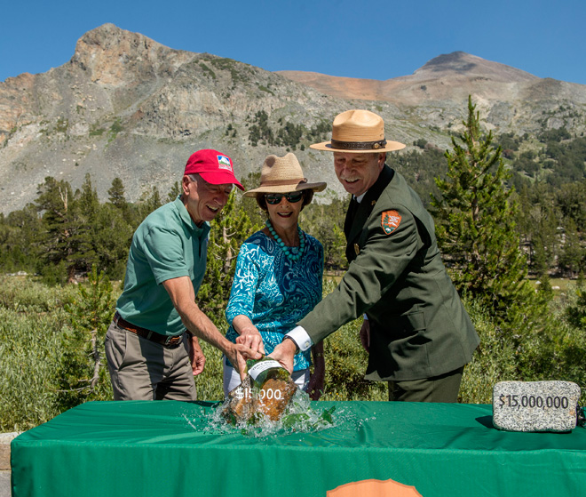 Jerry Edelbrock, Laura Bush, Former First Lady and Co-Chair National Park Service Centennial, and Yosemite Superintendent Don Neubacher. A "christening bottle" was broken over a ceremonial rock to reenact the original dedication, exactly 100 years ago.