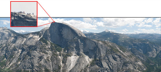 Inset pic pulled out of landscape showing people standing on top of Half Dome