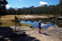 Person gazing at river