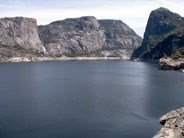 Kolana Rock (right) and Wapama Falls (left) rise above Hetch Hetchy Reservoir