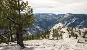 Views down granite slopes along Yosemite Valley's north rim.