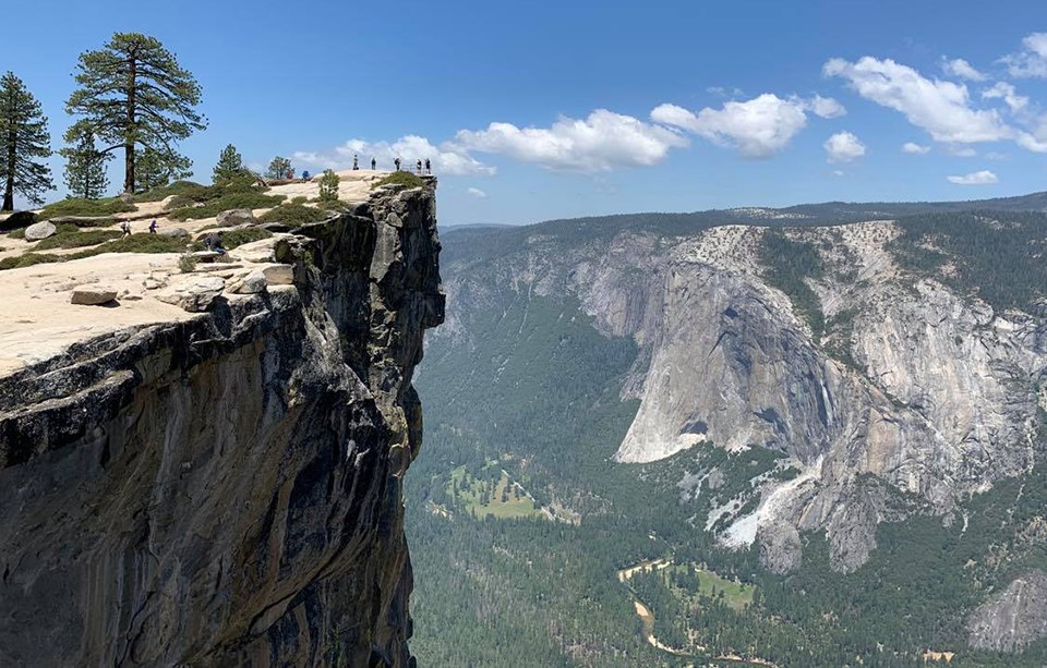 Taft Point with hikers at railing