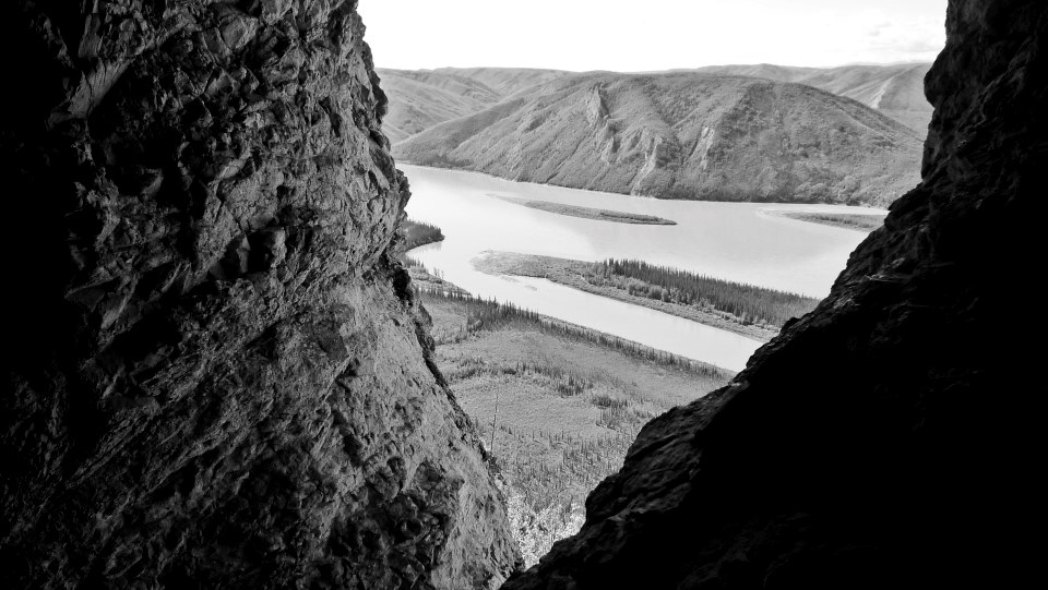 View of the Yukon River from the entrance of a cave high on a bluff