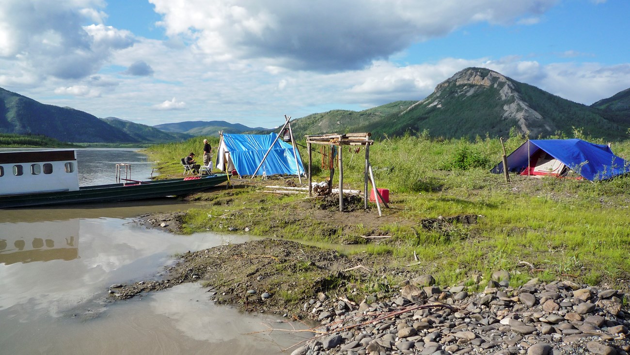 Traditional fish camp and boat on the Yukon River