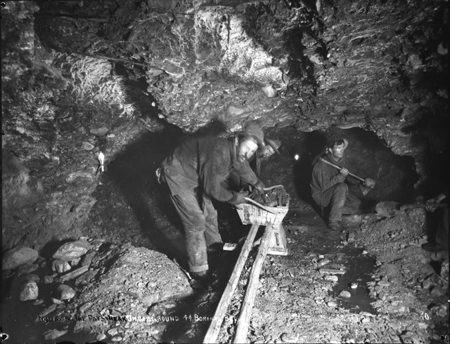 Miners excavating gravel at 44 Bonanza Claim, Yukon Territory, ca. 1898.
