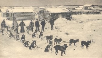 Historic photo of Downing's sleds prepared to leave Circle, Alaska.