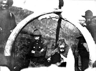 Woodchopper Miners pose with Mastadon Tusks, 1907