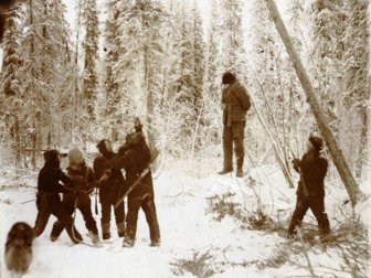 Historic photo (probably staged) of a group of miners hanging a criminal in 1898.