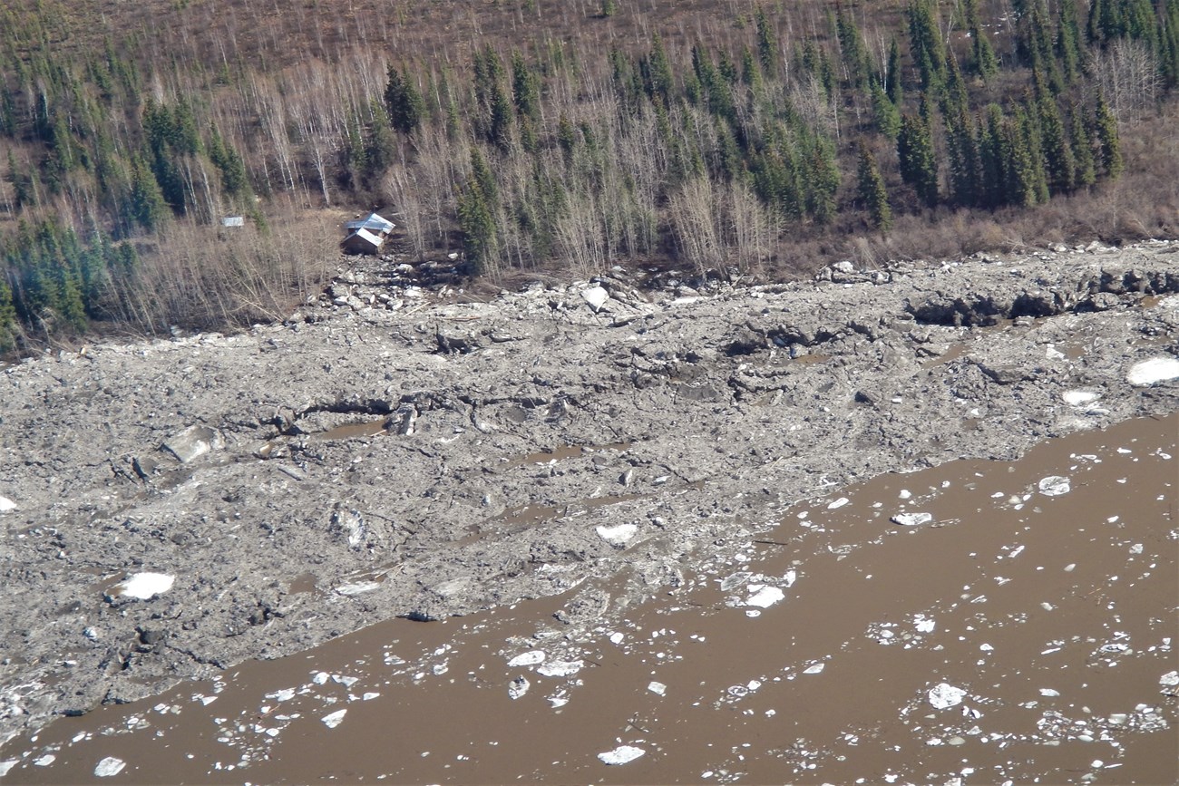 Aerial view of river ice remaining on the Smith Public Use Cabin shoreline, May 15, 2023.