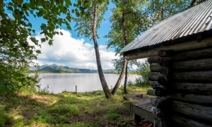 Glenn Creek Public Use Cabin view over the Yukon River in summer