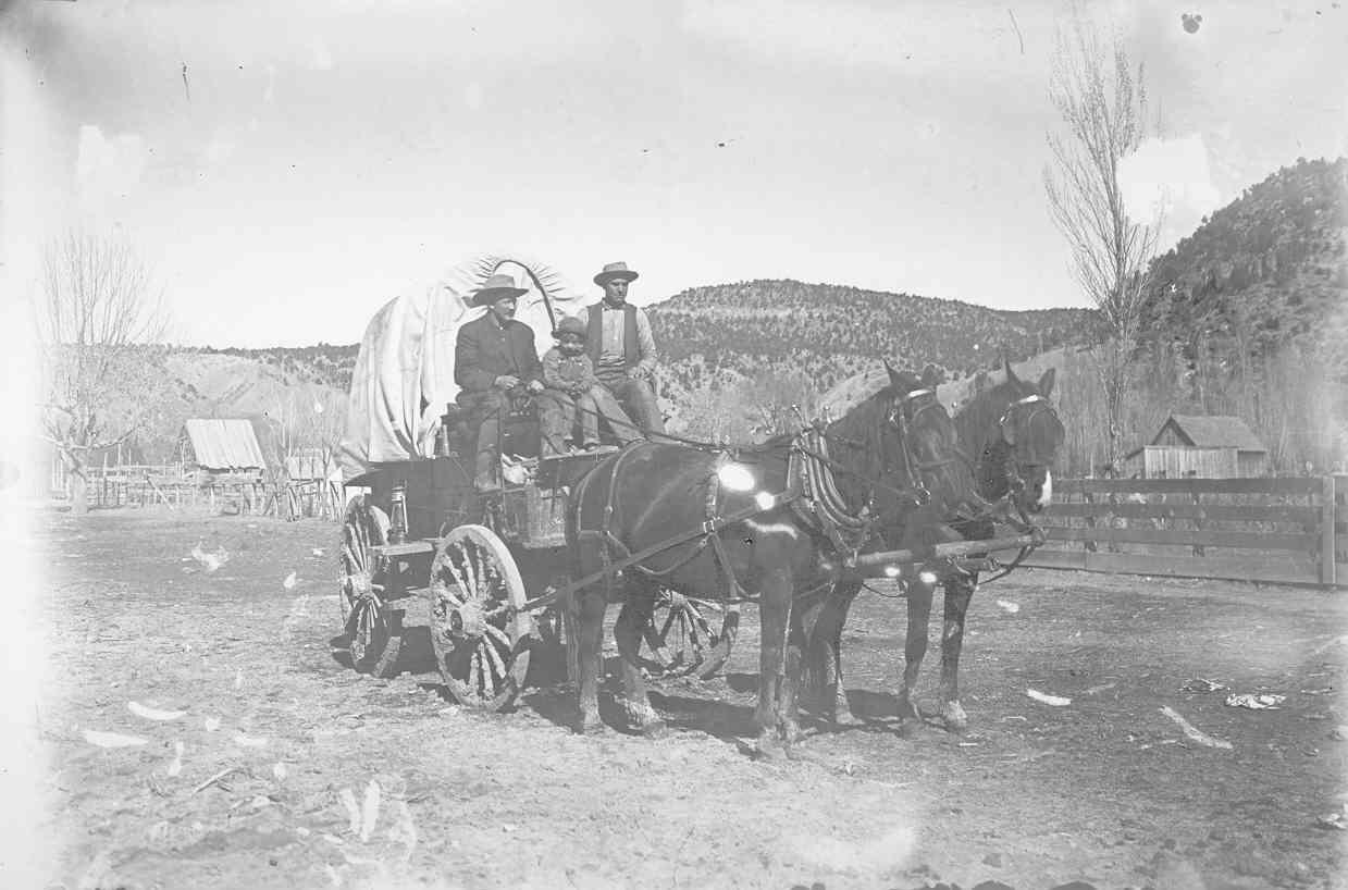 People in a wagon in Zion Canyon.