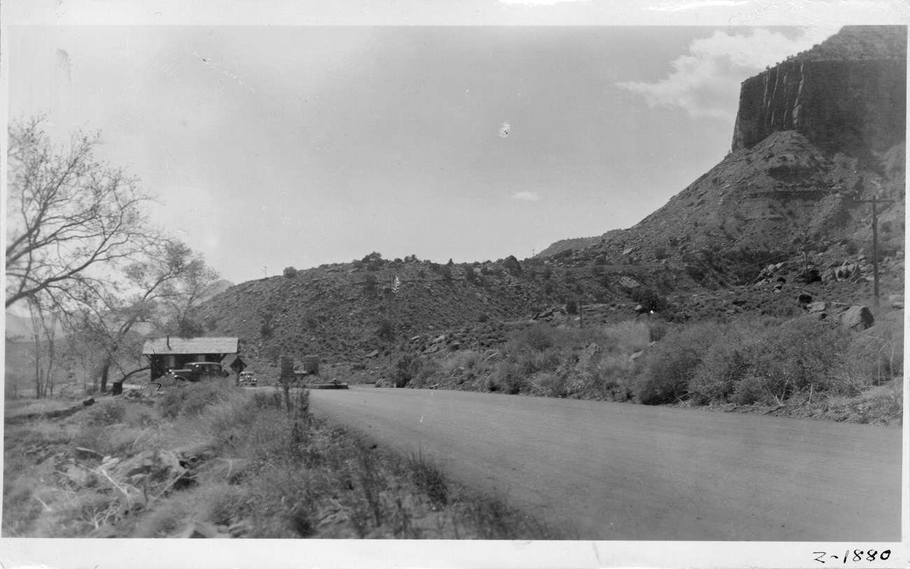 ZION 1880: The CCC created critical infrastructure that helped direct and control the increased visitation that was occurring in National Parks. One structure was the south entrance station.