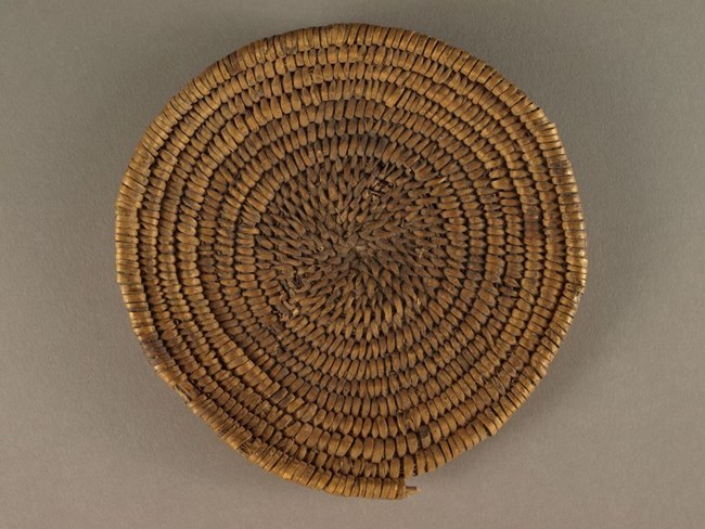 This basket is typical of items that date to the late Basket Maker period of Ancestral Puebloan occupations, roughly AD 1 to 700.
Zion Museum Collection ZION 18592 This basket is typical of items that date to the late Basket Maker period of Ancestral Puebloan occupations, roughly AD 1 to 700.
Zion Museum Collection ZION 18592