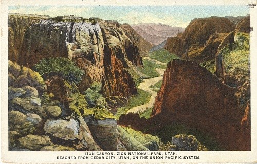 Postcard image depicting a view of Zion Canyon from atop the east rim, looking south over Angels Landing.